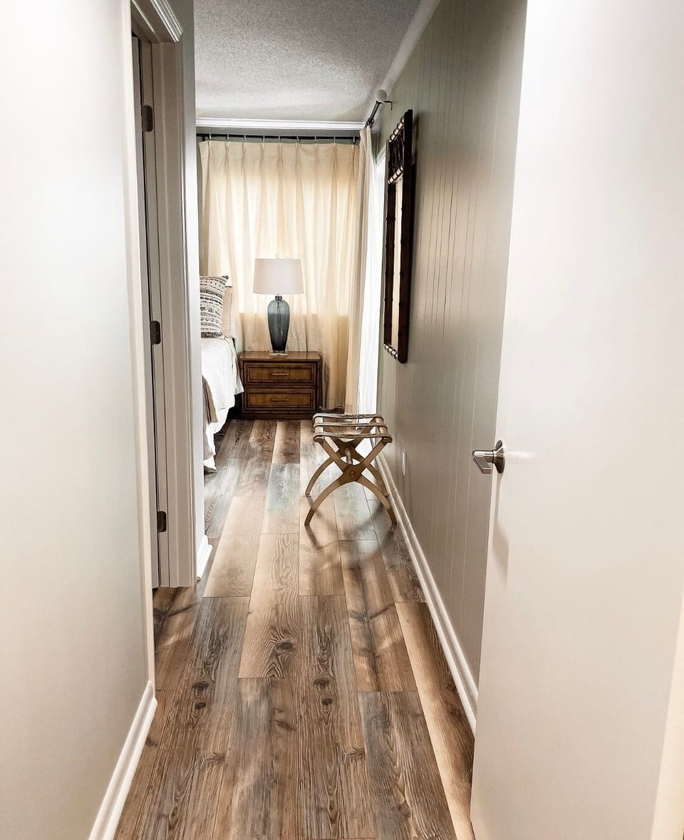 Pergo flooring in hallway and bedrooms

