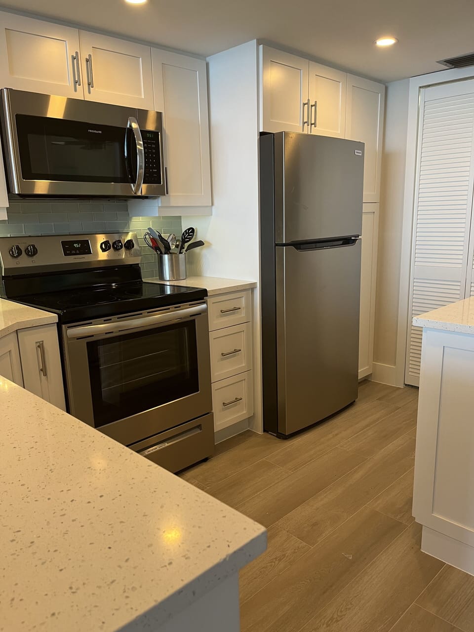 Lots of cabinets including pantry.