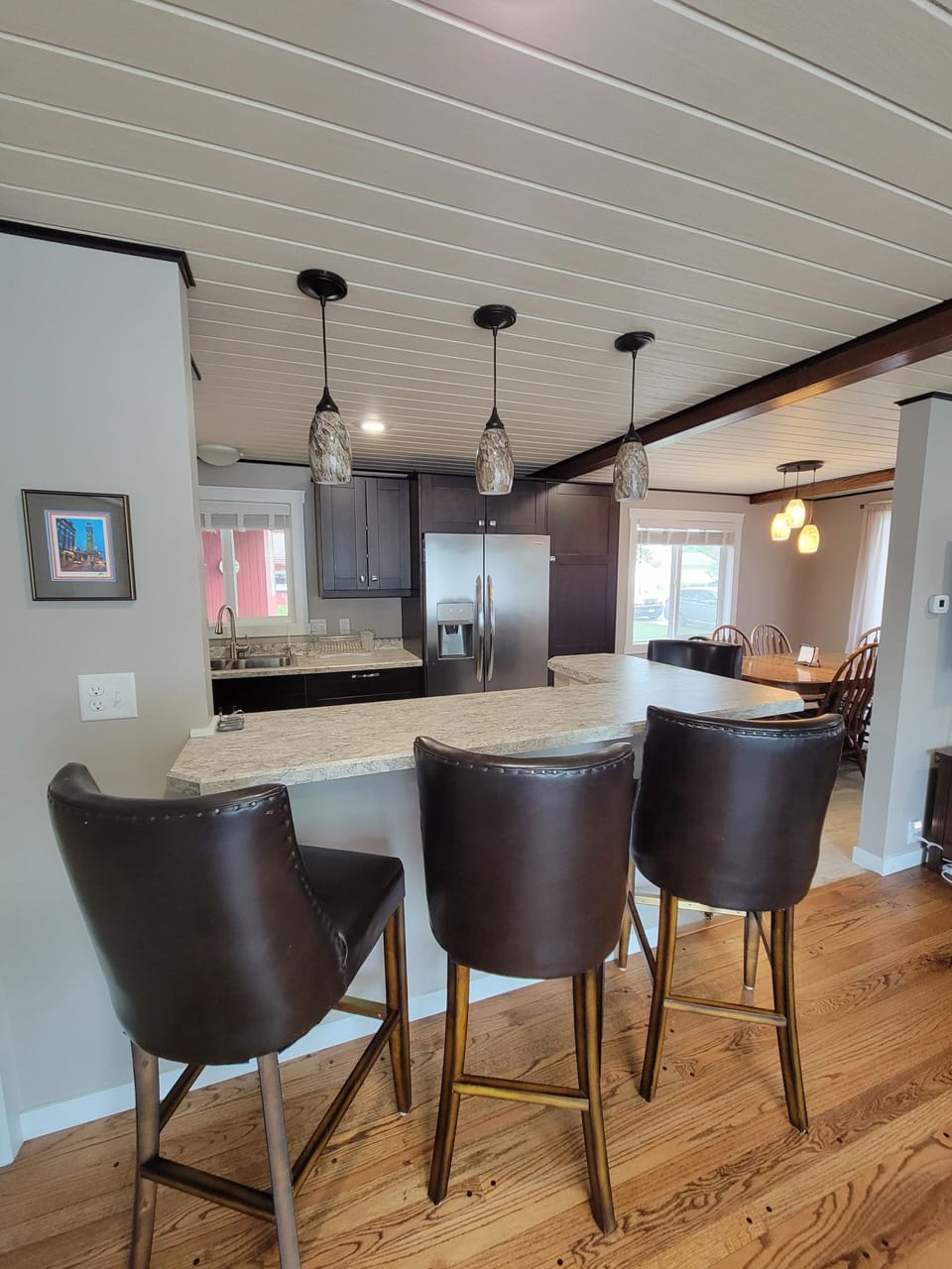 Additional bar seating for socializing or eating.