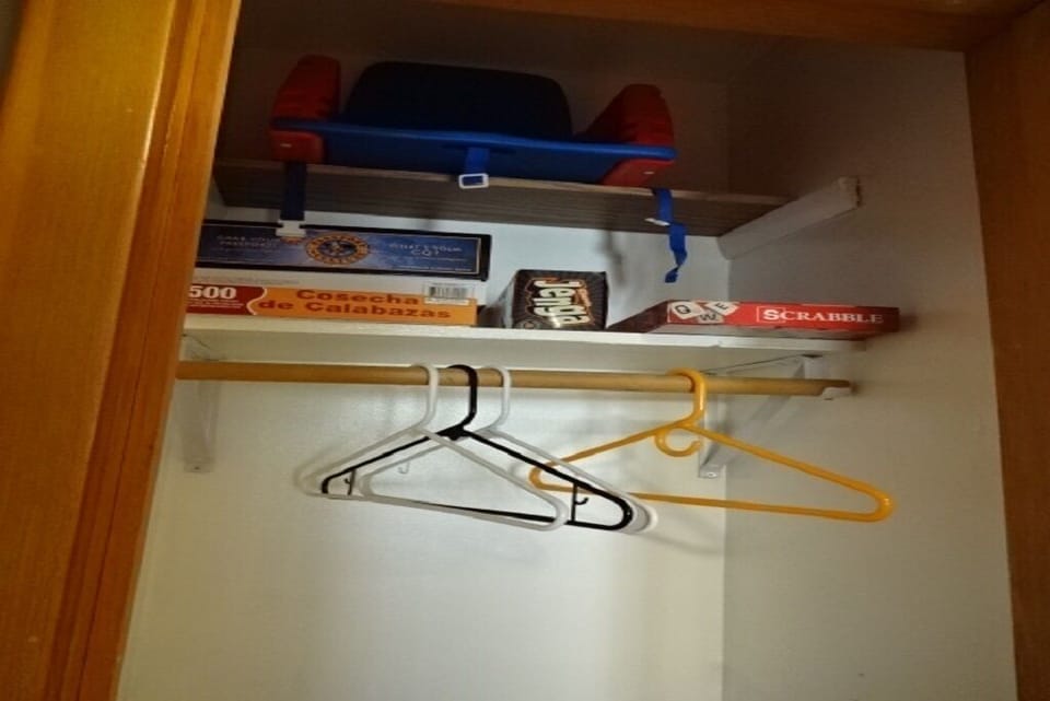 Closet in hallway.  Some fun game to play if bored.                          