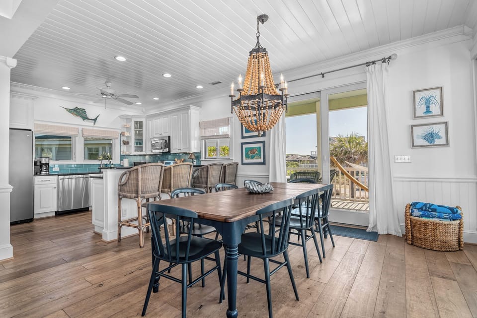 Indoor dining seats 12 with another 4 top table on the porch. 
