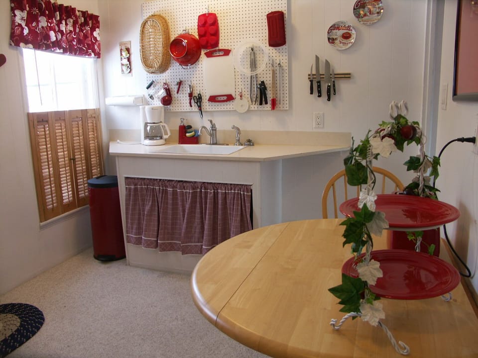 Upstairs kitchen is equipped with every utensil you could need.