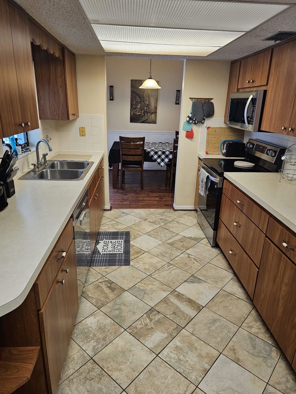 Kitchen facing dining area, view from main master bedroom with Jacuzzi