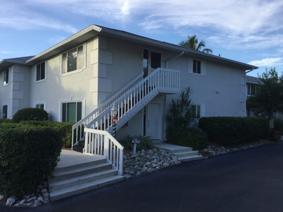 Exterior view - ground floor unit - steps from carport