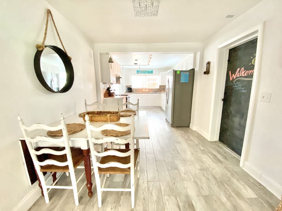 The dining table has a drop leaf which can be extended to seat the whole family.