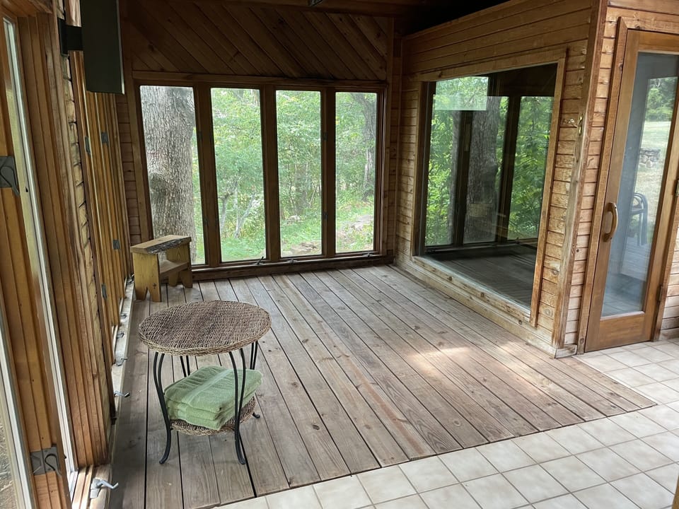 Beautiful sun room for relaxing. Sauna to the right