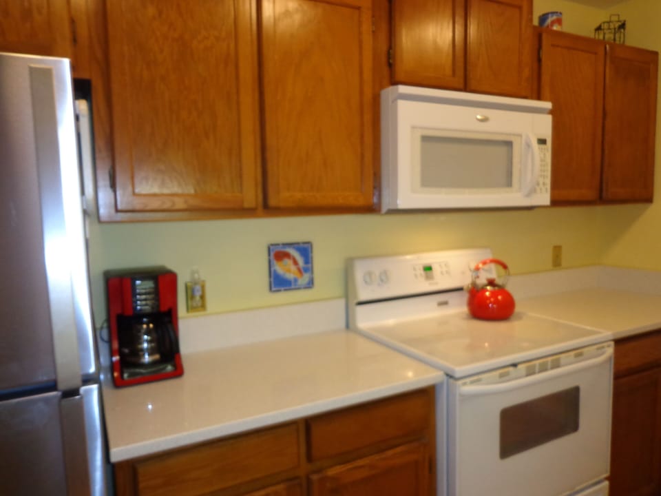Kitchen with quartz countertop.