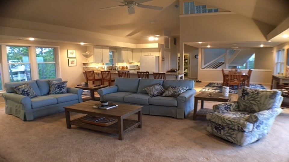 Open concept kitchen, dining, and living room. 