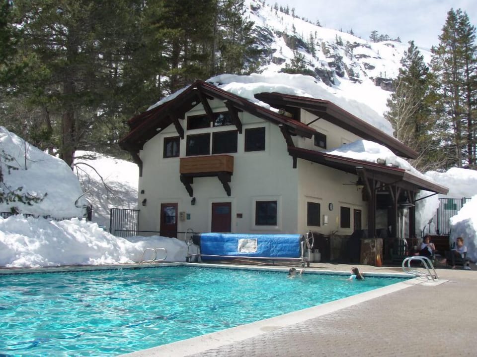 Heated Pool and adjacent hot tub & sauna. Clubhouse with gym, game room, large party room with kitchen