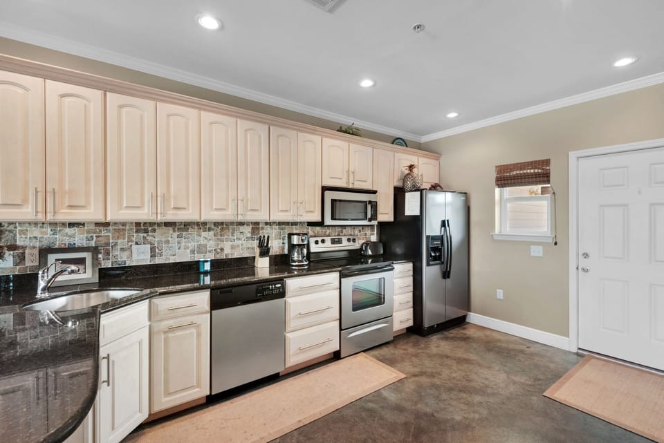 Kitchen with fully stocked dishes 