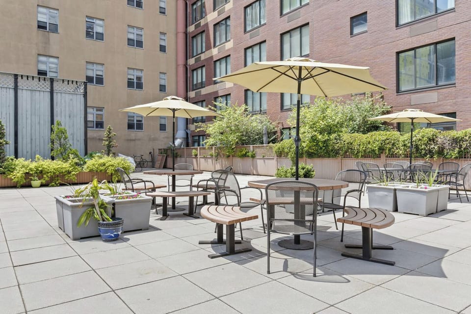 Rare private outdoor space for sunbathing and dining. 