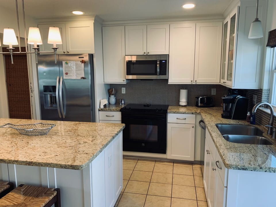 Microwave, stove & oven, toaster, blender, drip & Keurig coffee makers.