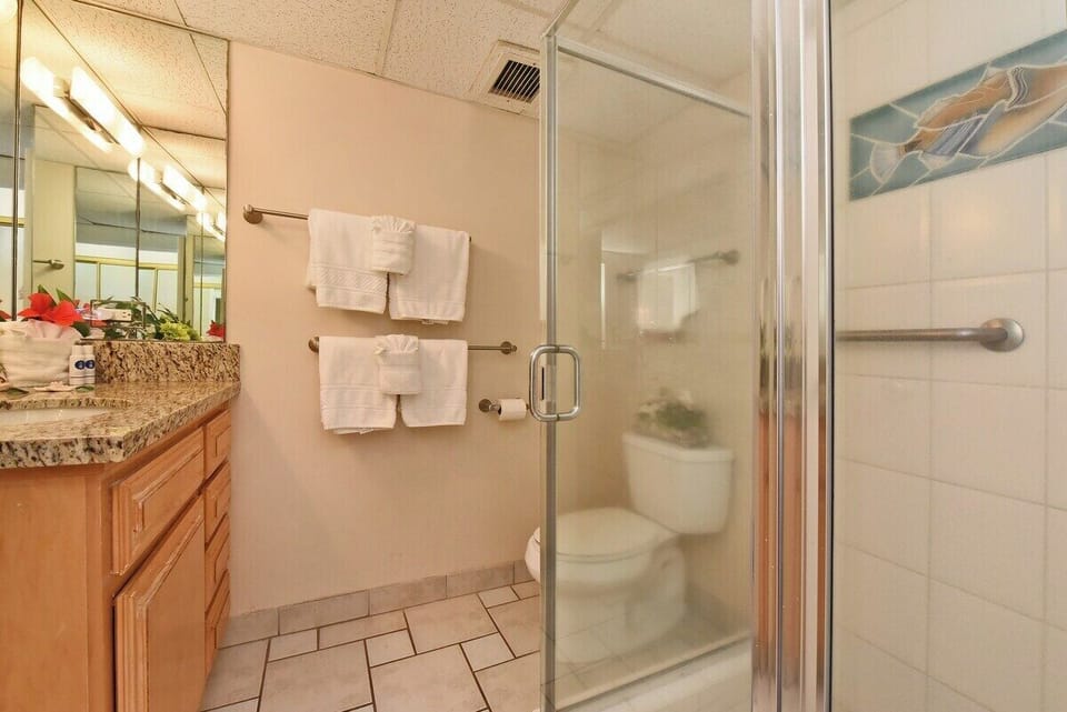 Bathroom with step-in tiled shower