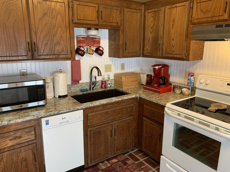 Kitchen — new granite countertops and backsplash installed in September 2020