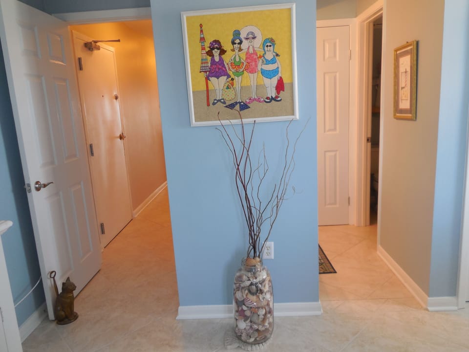 Entry hall on left, master bath on right