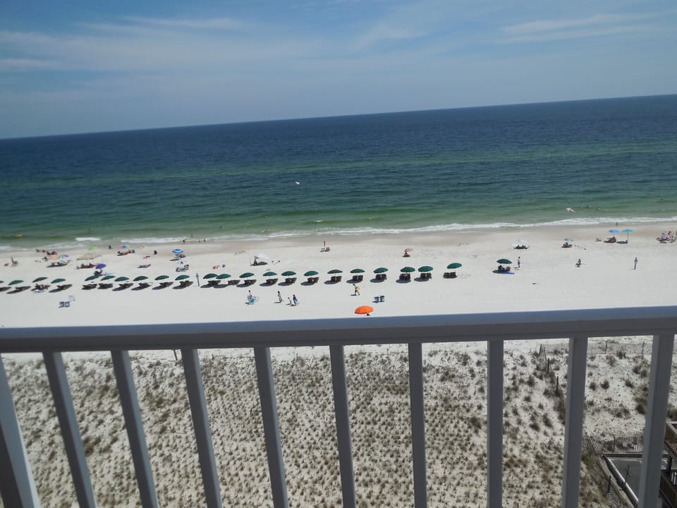 View from balcony-chairs and umbrellas for rent