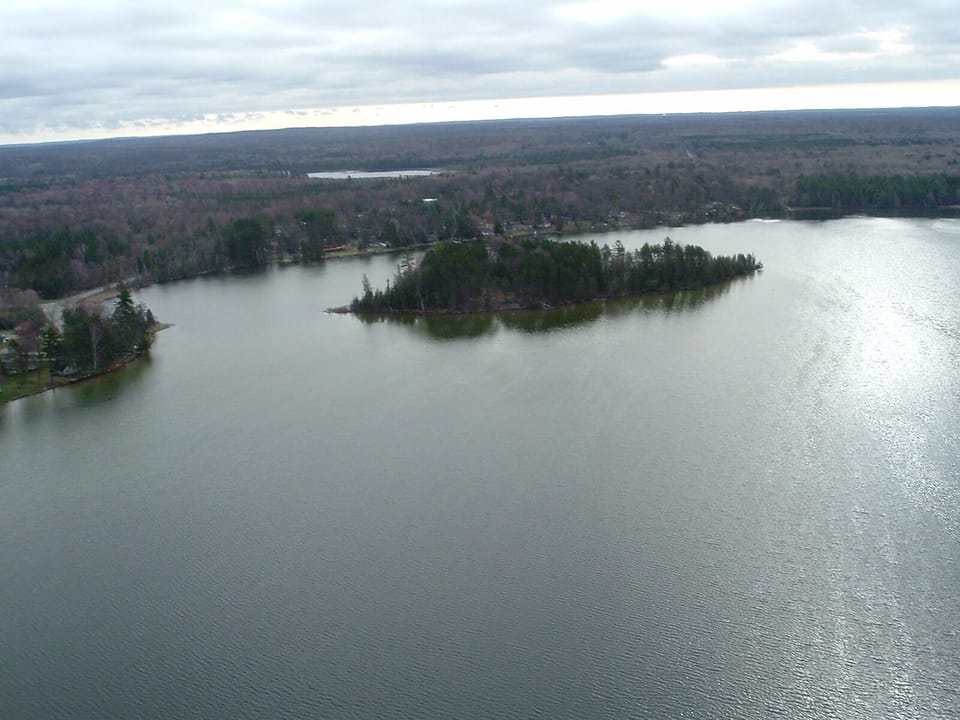 Aerial view of Jewell Lk, the cabin is located on the far shore, upper rt corner 