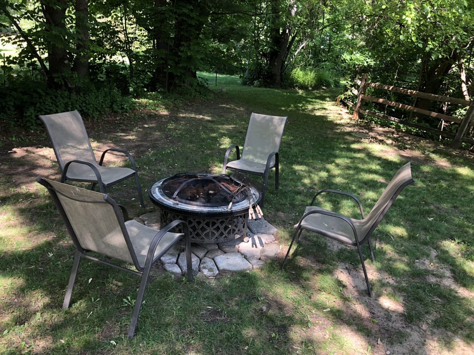 Backyard: Large deck, table & chairs for 12, gas grill, fire pit with 4 chairs