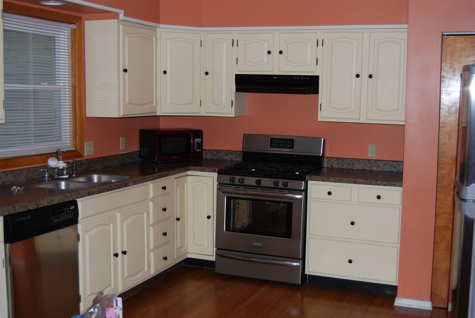 Large kitchen with gas range & full size refrigerator