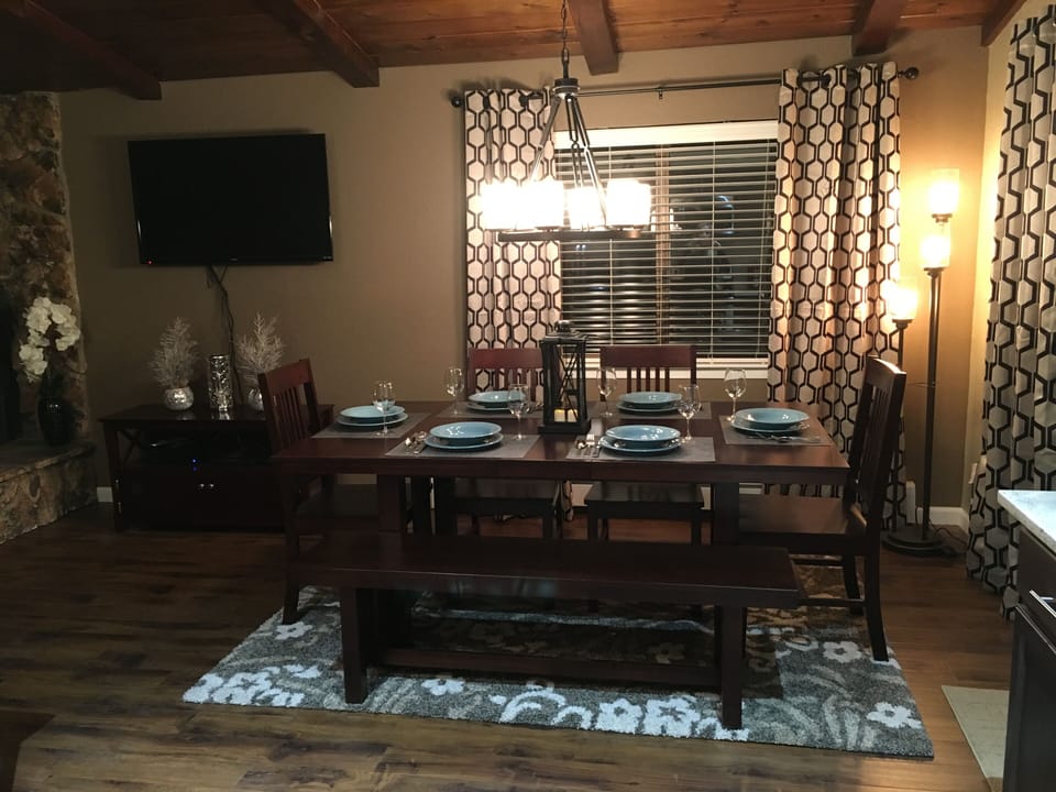Dining room w seating for 6. Seating for 3 more possible at the large island bar