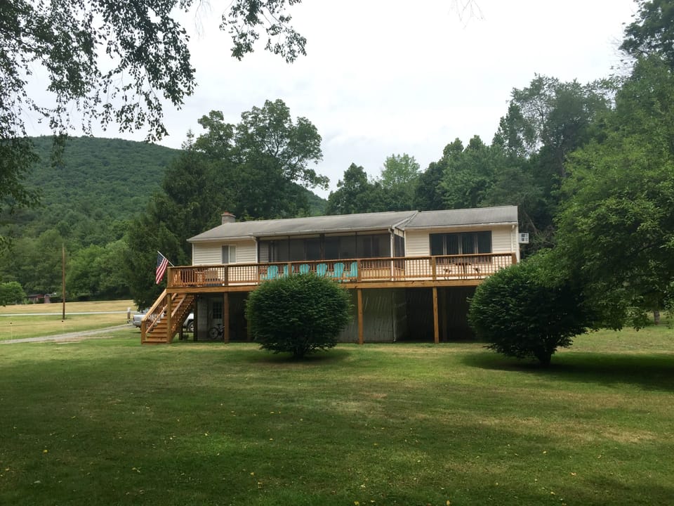 15'x54' deck with picnic table, chairs, grill & attached screen porch
