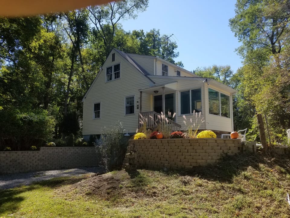 House from back showing sunroom