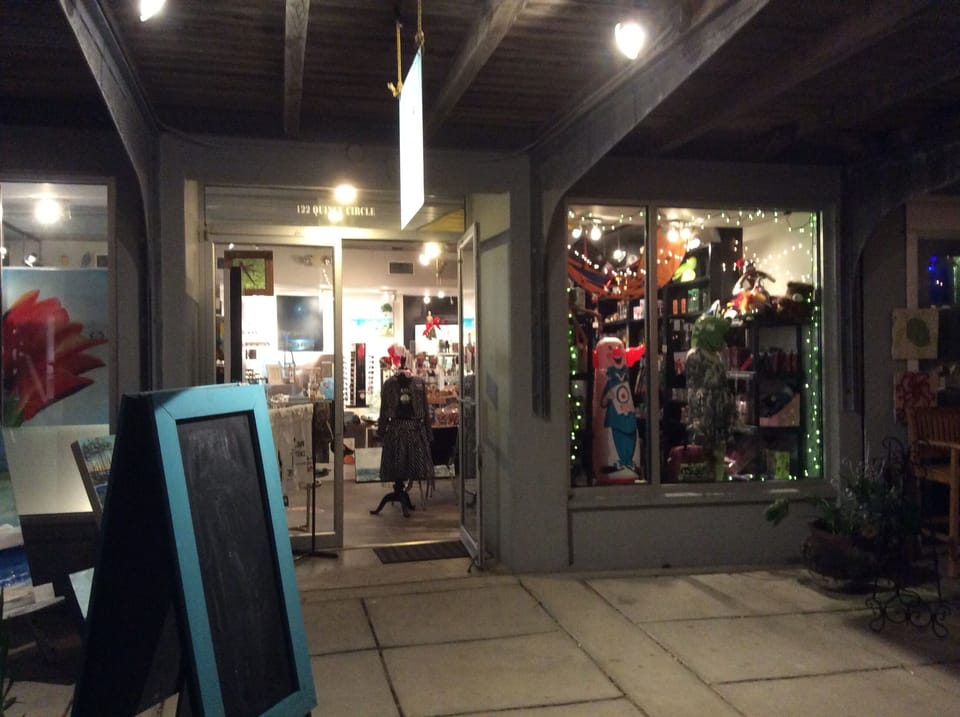 Picasso sun is located above Quincy Ave. Art n Things and pedestrian walkway