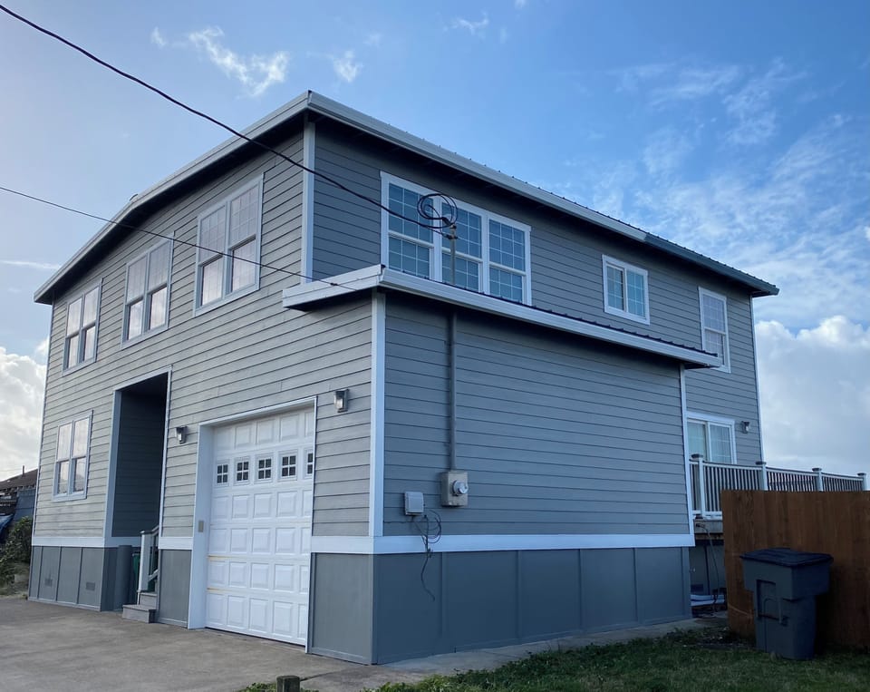 Street side of house. Entry to the home requires walking up 7 steps.  