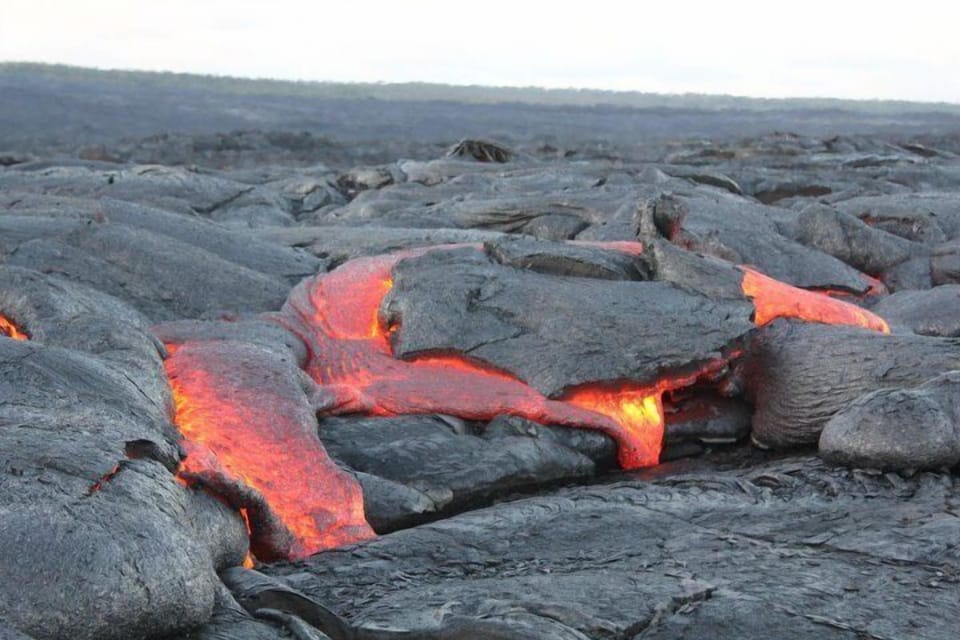 Surface lava flows happening now in Kalapana.