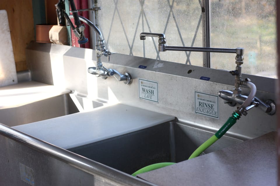 professional grade stainless cleaning sink and faucet. 