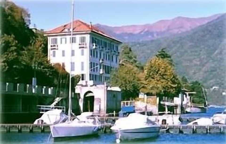 View of building from dock. (Large boat slip available.) View north to mountain.