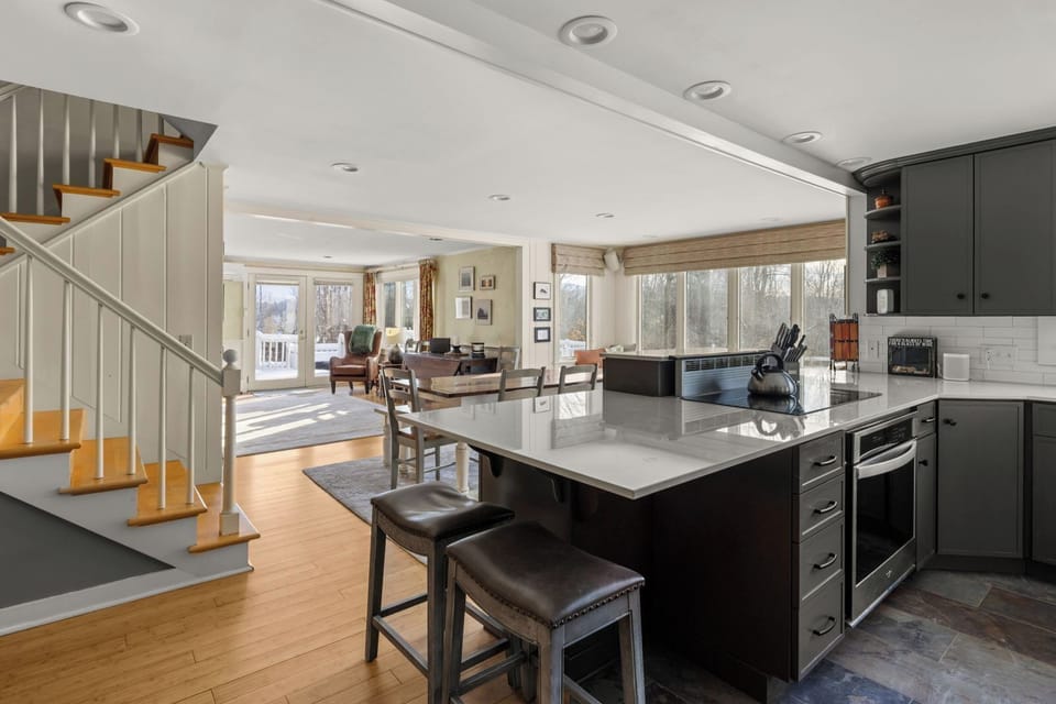 Open concept- partial view of kitchen, dining area, living room..(see floorplan)