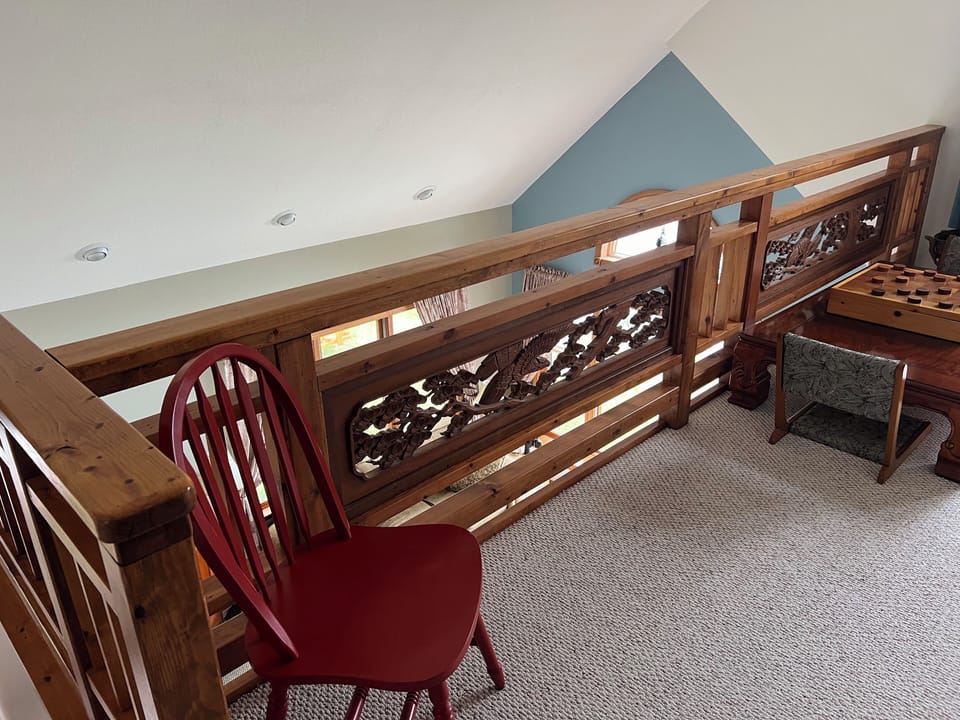 From the top of the stairs, you can enter the loft area.