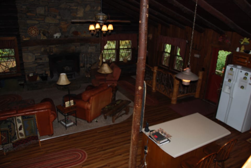 Kitchen Island and stairs to Game Room on right with Mountain Laurel Bannister