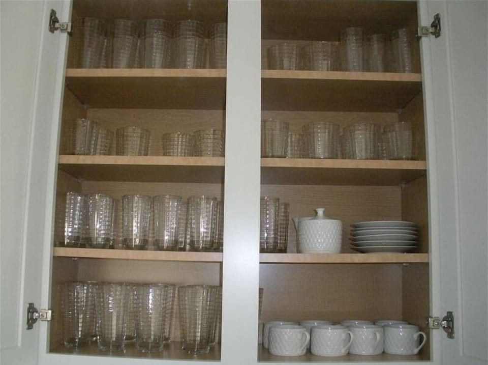 Plenty of glasses and dinnerware!