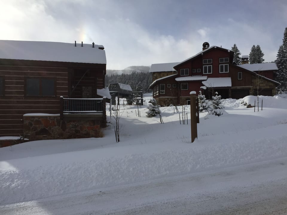 200 steps in ski boots from front door to base Lumberjack lift (center photo).