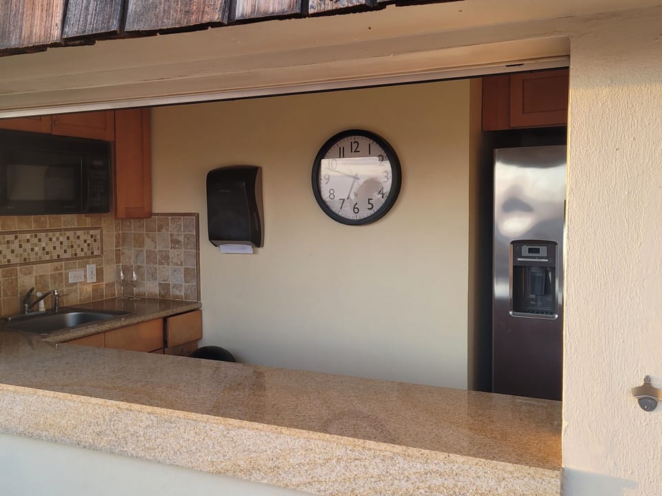 The Rooftop has a communal kitchen with a refrigerator & microwave