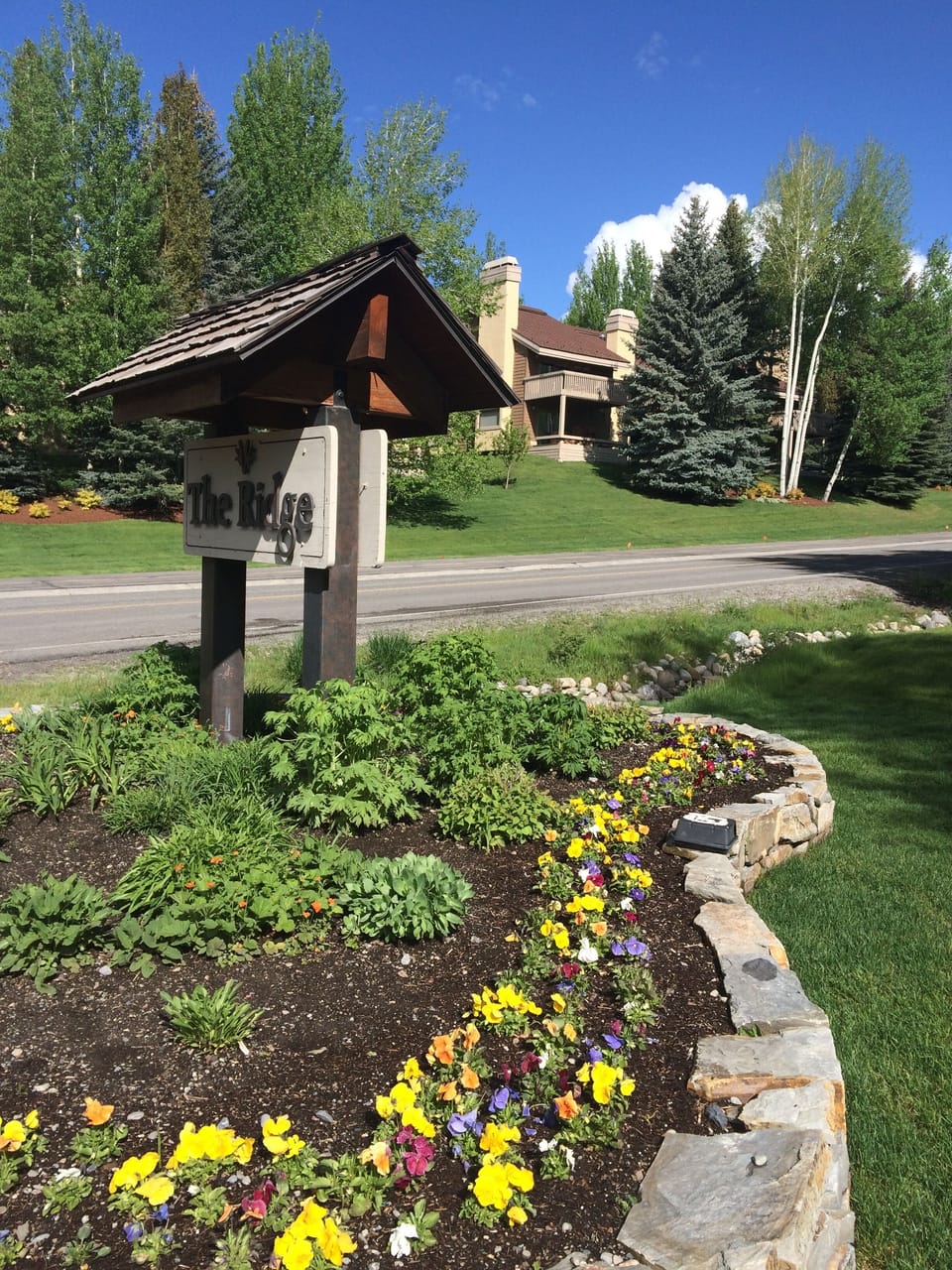 Entry to the Ridge Condominium complex in summer (looking north).