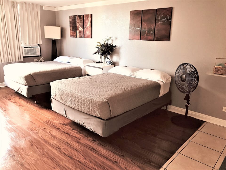 Studio A with window air conditioner and fan provided