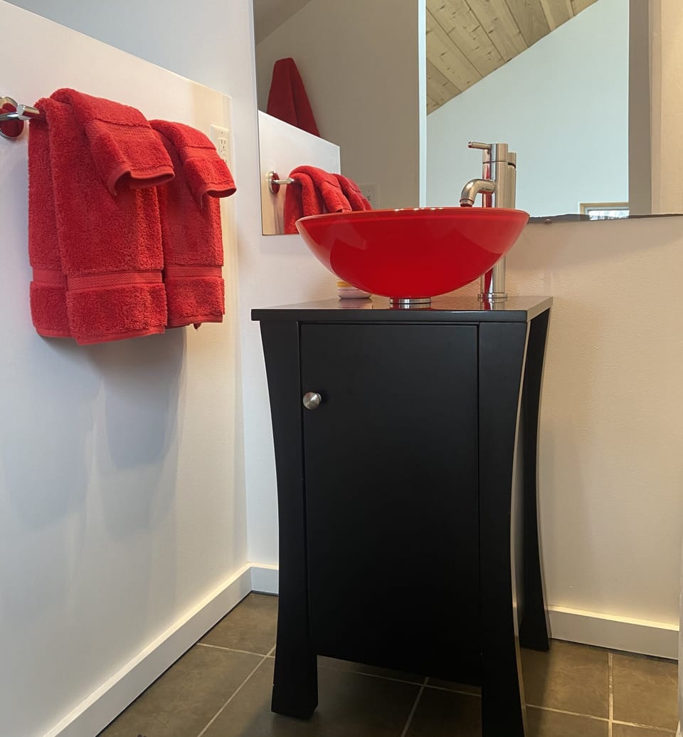 Full bathroom with tub and shower