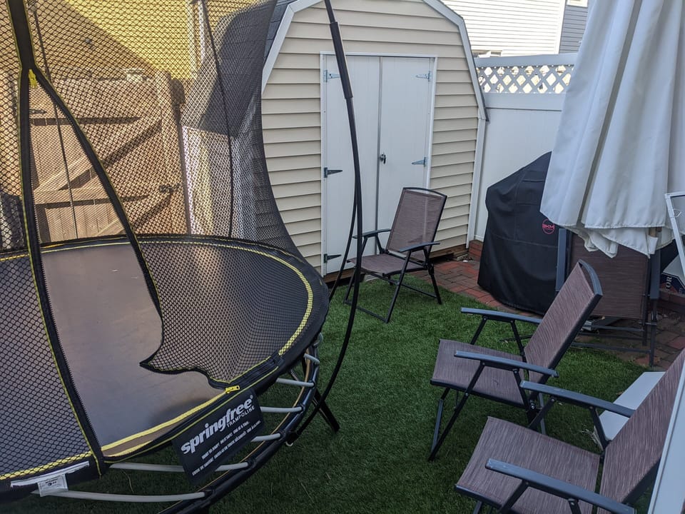 Backyard with trampoline
