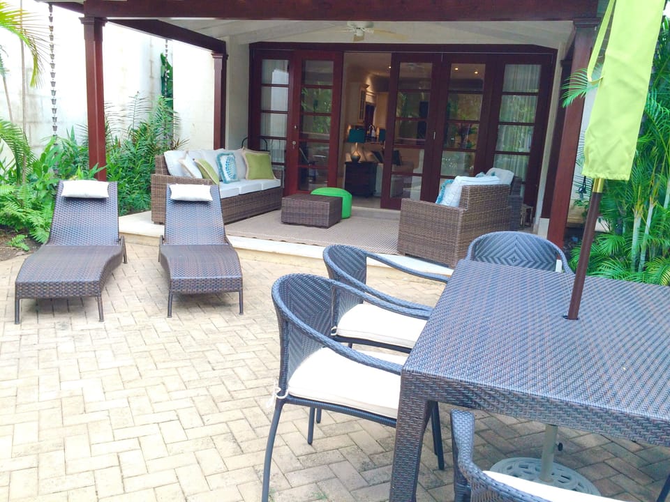 rear facing view of terrace from garden and pool

