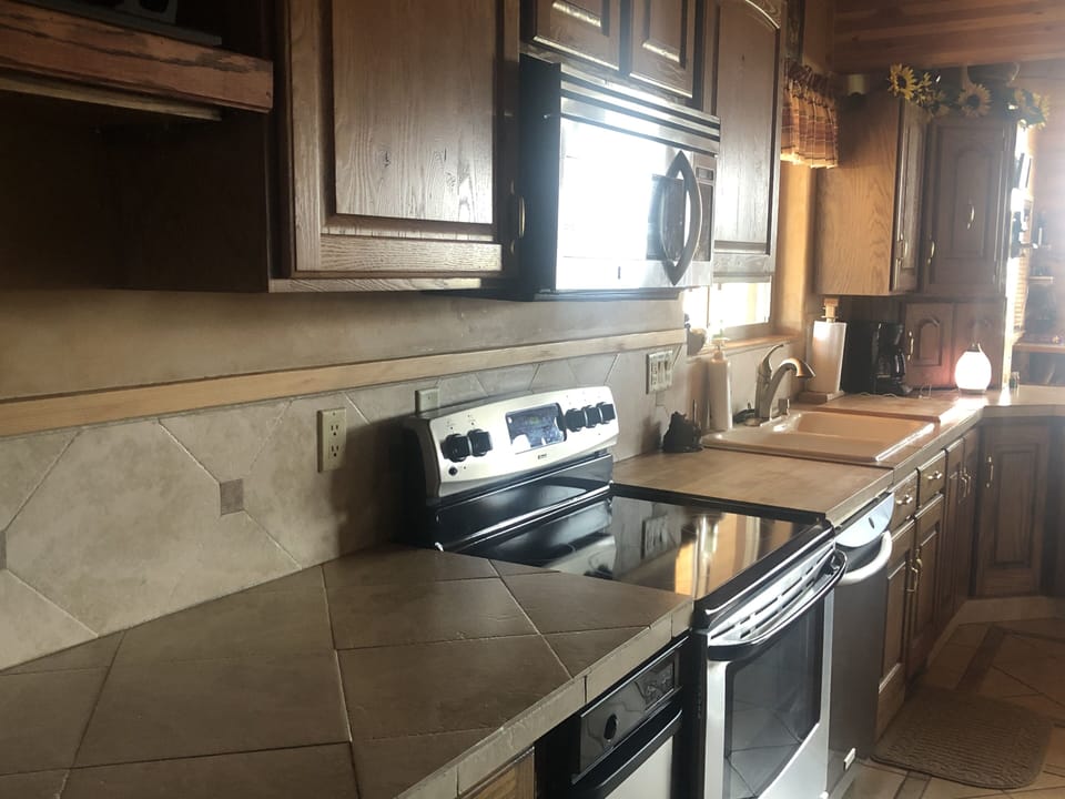 Close up view of oven/stove kitchen counter space