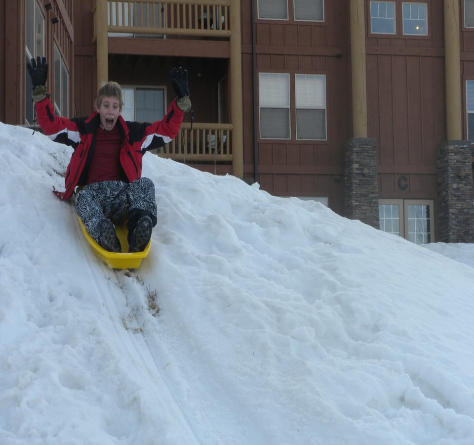 sledding right outside of the condo
