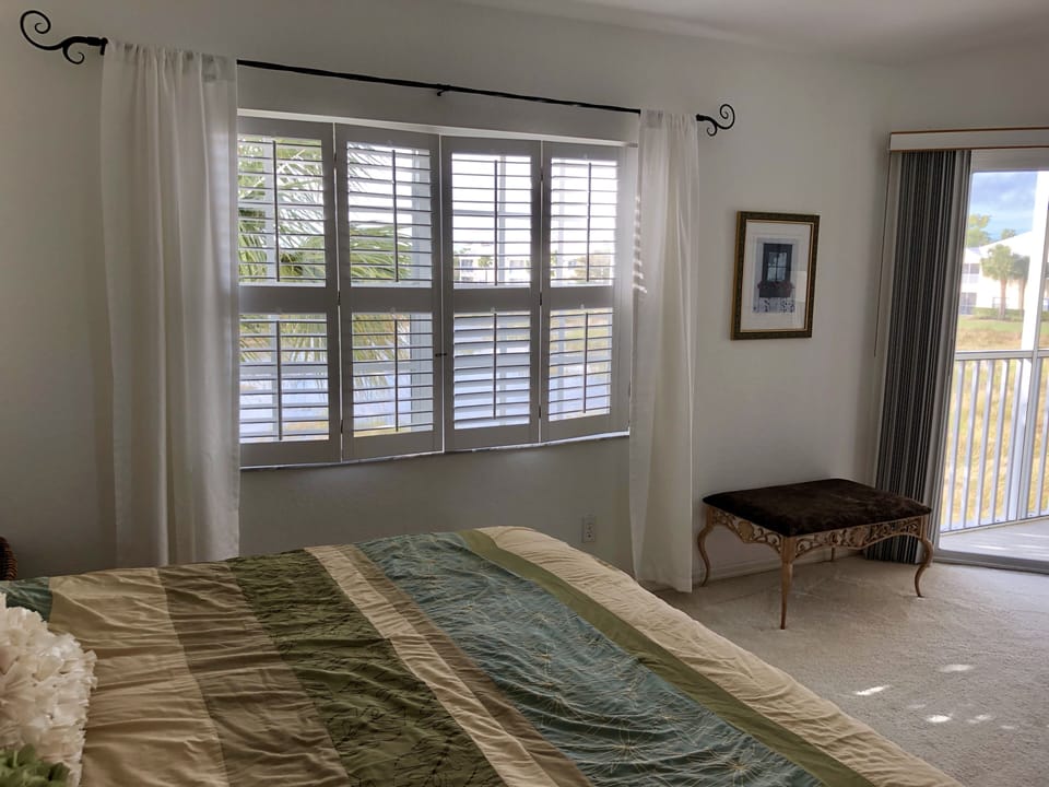 Master Suite Bedroom with Plantation Shutters