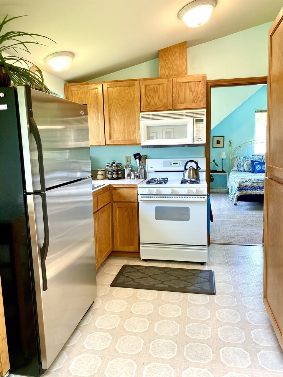 Kitchen peeking into the bedroom