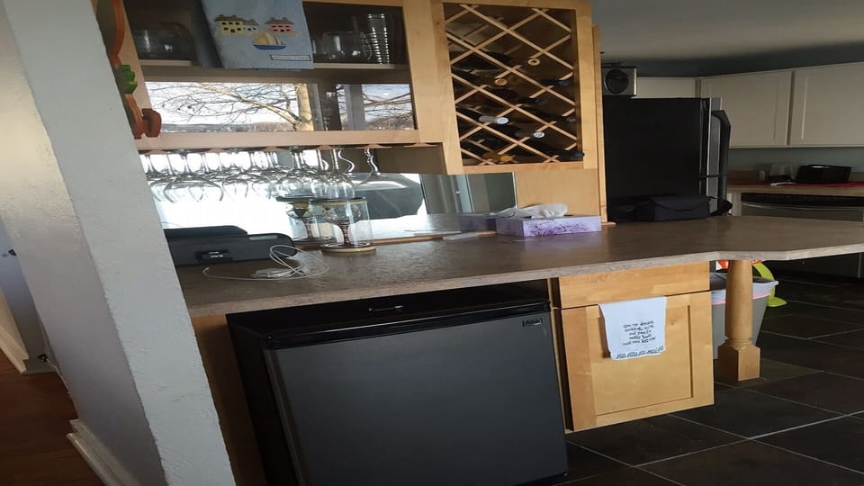 New Bar area well equipped with wine glasses