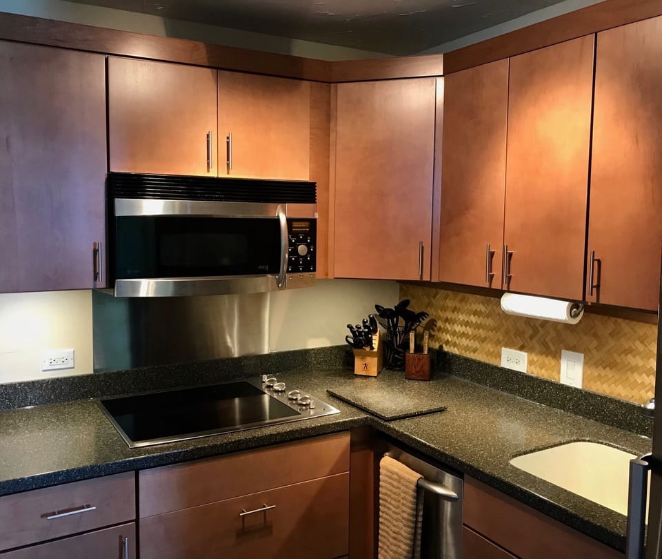 GE Profile appliances: Microwave/Convection oven. Glass stove top.