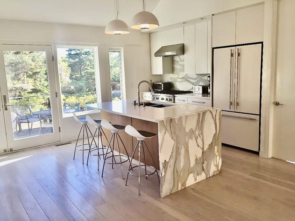 Kitchen opens onto deck and backyard

