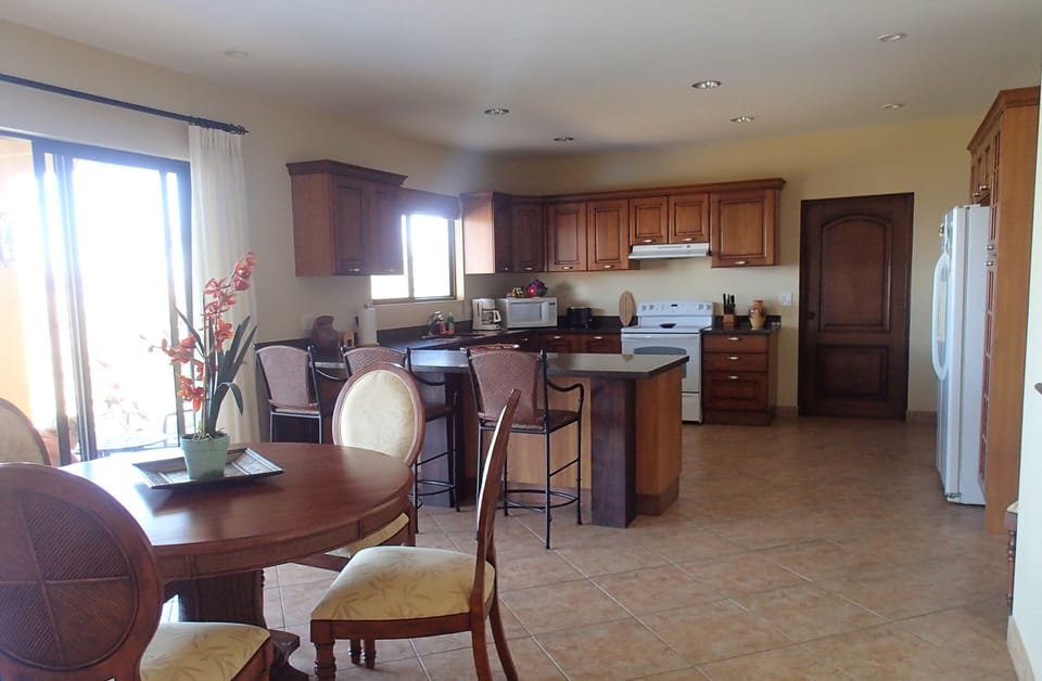 Kitchen and dining area (fridge has been replaced)